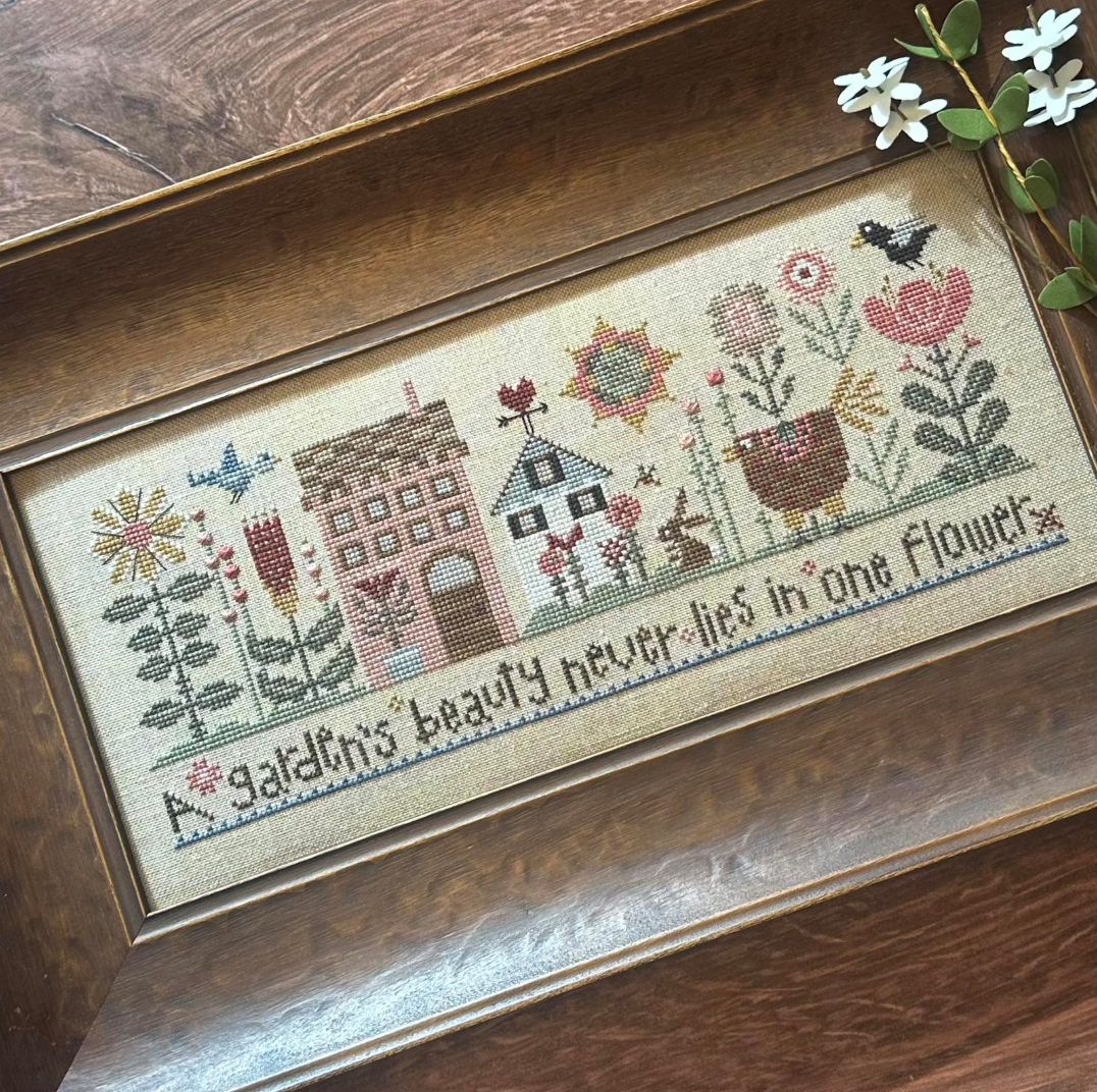 A Garden's Beauty by Heart in Hand